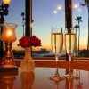 Tantra a perfect toast for two, set against a breathtaking view.