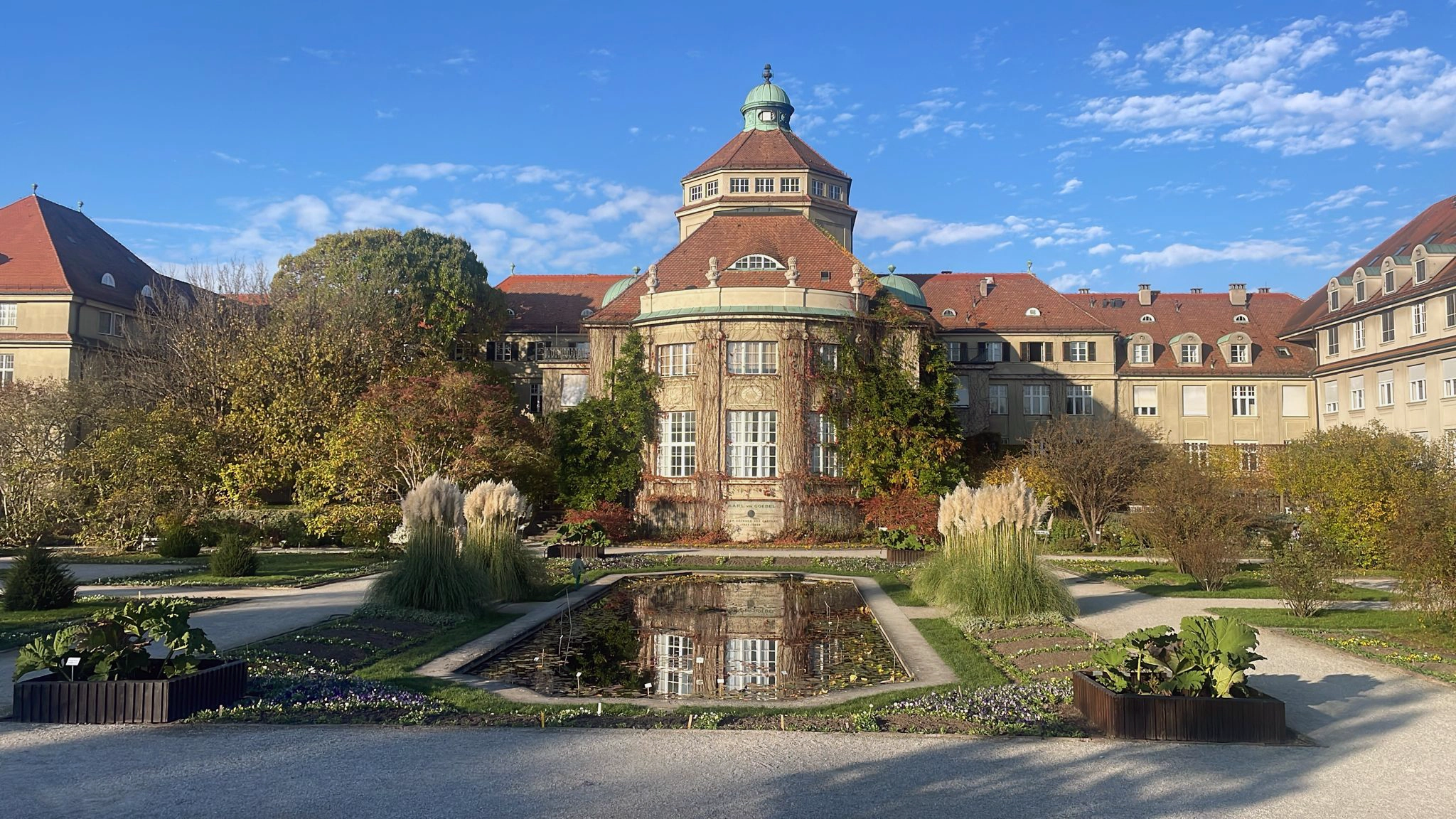 Tantra Pathways intertwining science and spirituality at Karl Goebel’s Botanical Garden, where nature’s essence meets Tantra’s wisdom in vibrant colors and forms