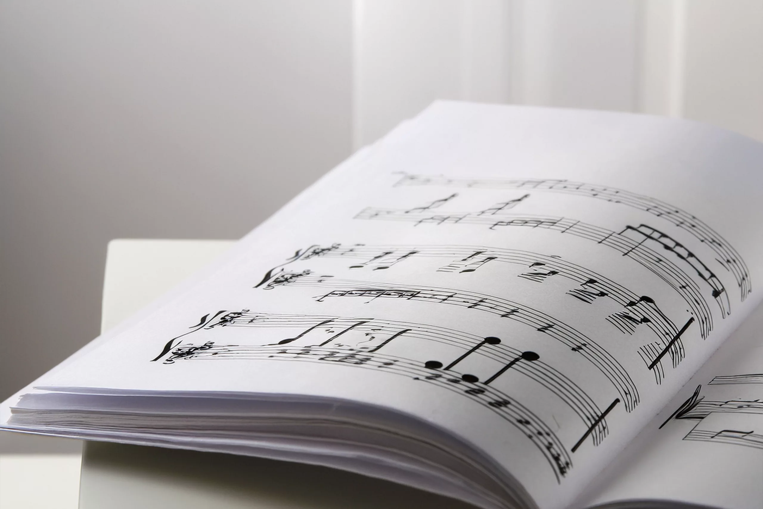 Close-up of Mozart’s handwritten sheet music, revealing the sacred geometry of sound and the invisible harmony of the cosmos