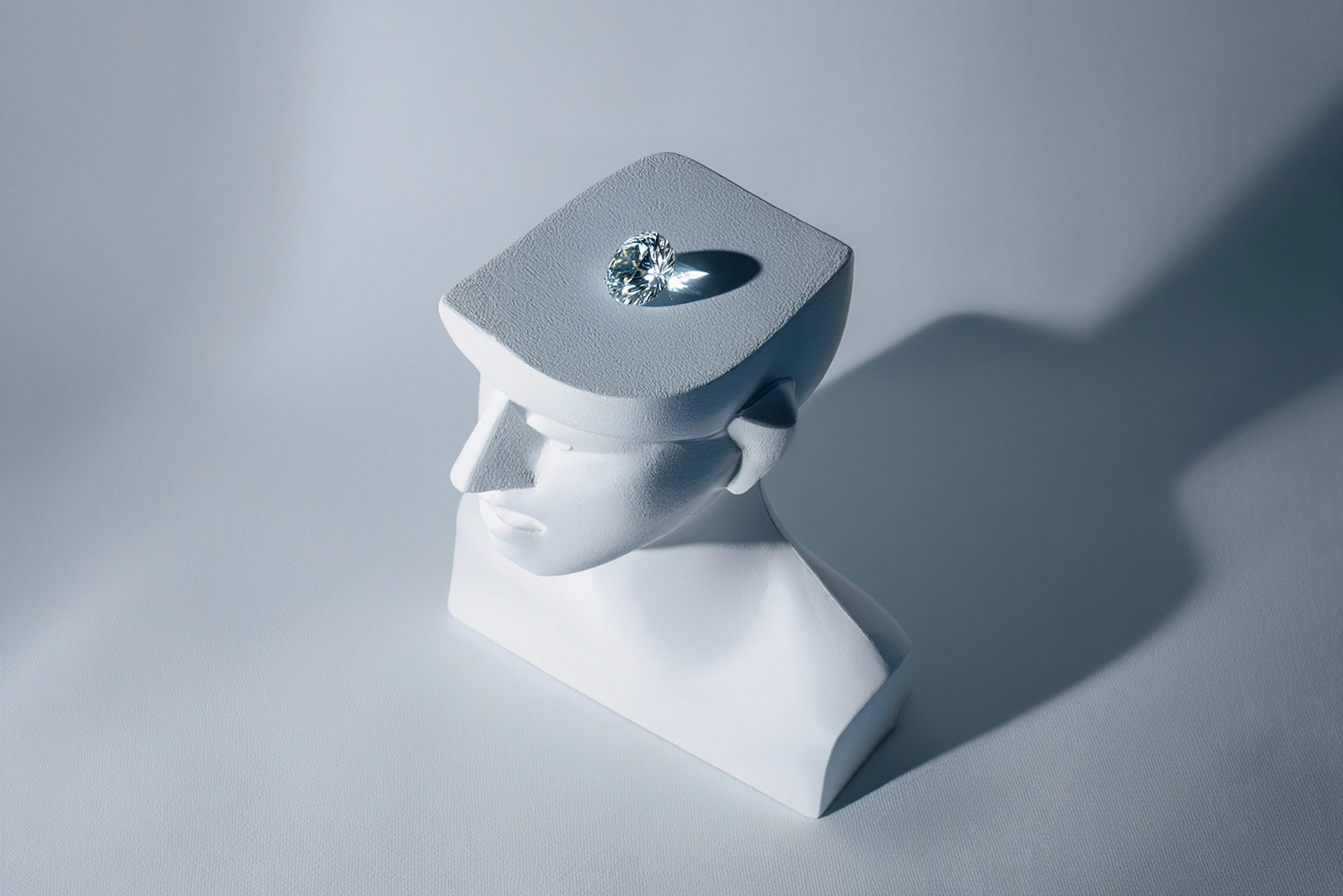 Meditative statue with a diamond placed above the head, symbolizing thought beyond the mind and deep intuition